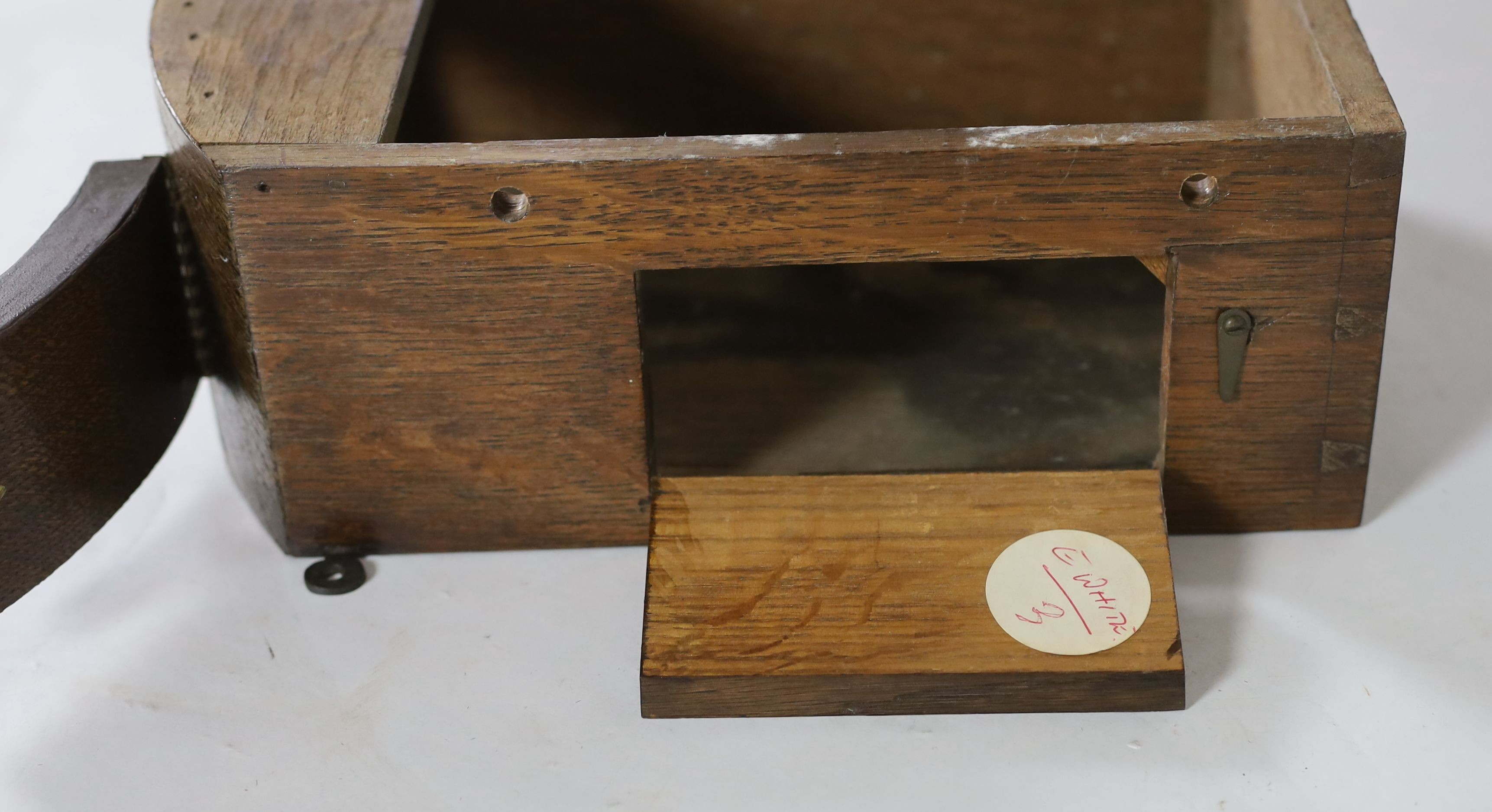 E. White, 20 Cockspur Street, London. A late Victorian oak cased wall timepiece, diameter 38cm